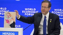 Source: Twitter/@Isaac_Herzog. Israeli President Isaac Herzog addressed The World Economic Forum's 54th Annual Meeting in Davos last week, calling on world leaders to not forget the hostages taken captive by Hamas gunmen on 7 October 2023. The hostages include both Israelis and Muslims, among them Kfir Bibas who turned one last week. President Herzog is seen here seated at #WEF2024 next to a photo of Kfir Bibas, taken shortly before Bibas was abducted.