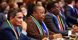 South Africa's Department of International Relations and Cooperation (Dirco) Director-General Zane Dangor, South African Foreign Minister Naledi Pandor and South African Ambassador to the Netherlands Vusimuzi Madonsela listen as the International Court of Justice (ICJ) rule on emergency measures against Israel following accusations by South Africa that the Israeli military operation in Gaza is a state-led genocide, in The Hague, Netherlands, 26 January 2024. Reuters/Piroschka van de Wouw