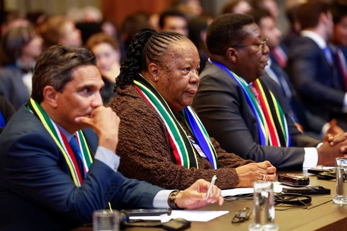 South Africa's Department of International Relations and Cooperation (Dirco) Director-General Zane Dangor, South African Foreign Minister Naledi Pandor and South African Ambassador to the Netherlands Vusimuzi Madonsela listen as the International Court of Justice (ICJ) rule on emergency measures against Israel following accusations by South Africa that the Israeli military operation in Gaza is a state-led genocide, in The Hague, Netherlands, 26 January 2024. Reuters/Piroschka van de Wouw