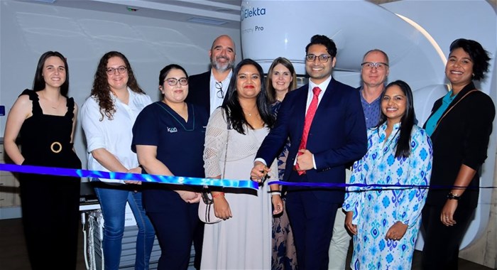 A first for sub-Saharan Africa: The Elekta Harmony Pro was unveiled with a ribbon-cutting at the Sandton Oncology Centre in Johannesburg by resident oncologists at the unit. From left to right (front) Ghita Bruwer, medical physicist, Icon Oncology; Johanet van Tonder, medical physicist, Icon Oncology; Ameera Heetun, lead radiotherapist, Sandton Oncology Centre, Dr Nirasha Chiranjan, oncologist; Lizl Page, regional business manager, Icon Oncology; Dr Sudeshen Naidoo, oncologist; Dr Shivona Moodley, oncologist; and Achal Sonbadhar, regional area manager, Icon Oncology. From left to right (back) Dr Ernst Marais, COO Icon Oncology; Lizl Page, regional business manager, Icon Oncology; and Dr Ingo de Mûelenaere, oncologist.