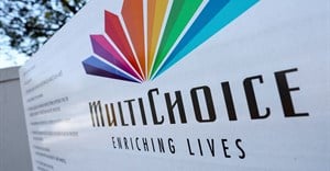 A MultiChoice logo is displayed outside the company's building in Cape Town, South Africa. Source: Reuters.