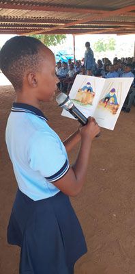 Read Aloud event at Lot Phalatse Primary School, reading by Lerato Mabelane Grade 7 read to the entire school.