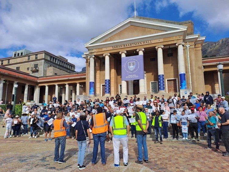 Members of the University of Cape Town Employees Union gather on the plaza outside Sara Baartman Hall on the first day of a strike expected to last till the end of next week. Photo: Liezl Human
