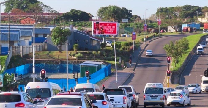 Illuminated large static billboard along a major arterial. Picture courtesy of Inform Media – Media that Breaks New Pavements