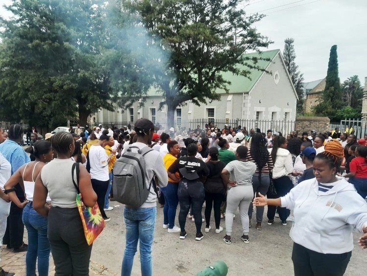 East Cape Midlands College students burn paper and cardboard outside the college gates on Friday morning after forcing staff off the premises. Photo: Loyiso Dyongman