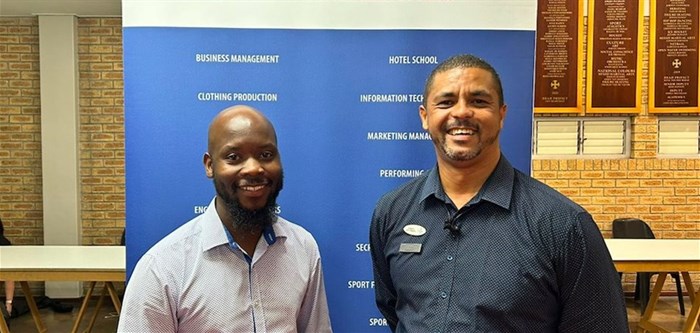 On the left is Mohale Manyane, and on the right, Damian September of the Northlink TVET College recruitment team