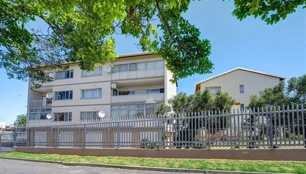 Source: Supplied. Priced at R1.3m through Pam Golding Properties, this recently renovated two-bedroom apartment with a large balcony is situated in a well-maintained complex in Oostersee, Parow.