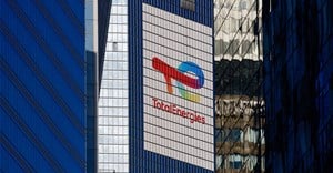 The logo of French oil and gas company TotalEnergies is seen at the company's headquarters skyscraper in the financial and business district of La Defense, near Paris. Source: Reuters/Gonzalo Fuentes