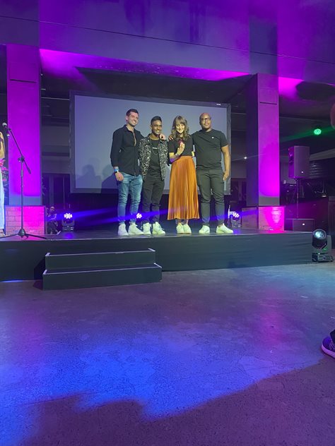A few members of the Grid Worldwide team on stage to accept the Best Design award for the Pantry by Marble Group brand identity: Jarryd Buchalter, Jineil Kandasamy, Izabel Barkhuizen and Tefo Sebulele