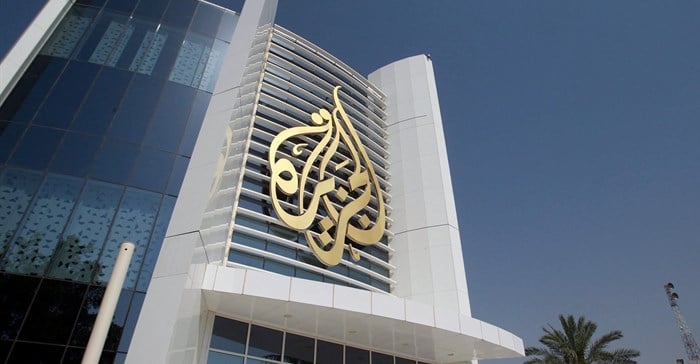 The Al Jazeera Media Network logo is seen on its headquarters building in Doha, Qatar June 8, 2017. REUTERS/Naseem Zeitoon/File Photo