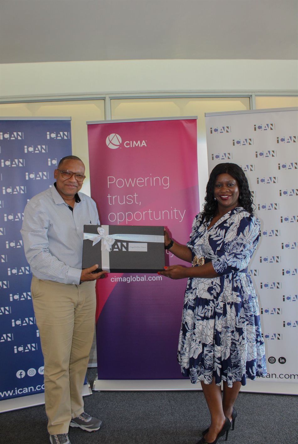 From left to right, Florian Hartzenberg, ACMA, CGMA, CA(NAM), welcomed to the ICAN family with a certificate presented by the ICAN CEO, Fenni Nghikevali, CA(NAM).