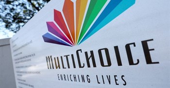 A MultiChoice logo is displayed outside the company's building in Cape Town, South Africa. Source: Reuters/Esa Alexander.