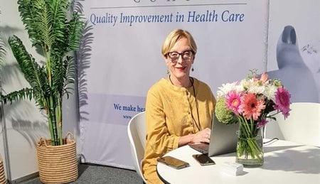 CEO Jacqui Stewart catches up with emails at the COHSASA stand at the Hospital Show