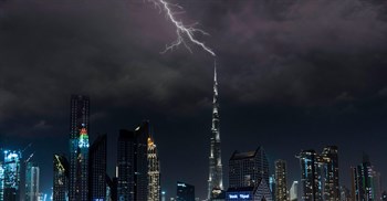 Source:  A photo taken of Dubai's skyline under a stormy sky in October 2020.