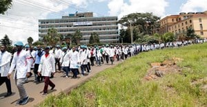 Doctors and medical practitioners under the Kenya Medical Practitioners Pharmacists and Dentists Union (KMPDU) participate in a demonstration to demand payment of their salary arrears and the immediate hiring of trainee doctors, among other grievances, in Nairobi, Kenya, 16 April 2024. Reuters/Thomas Mukoya/File Photo