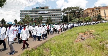 Doctors and medical practitioners under the Kenya Medical Practitioners Pharmacists and Dentists Union (KMPDU) participate in a demonstration to demand payment of their salary arrears and the immediate hiring of trainee doctors, among other grievances, in Nairobi, Kenya, 16 April 2024. Reuters/Thomas Mukoya/File Photo