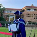 Refugee and former car guard graduates with a PhD