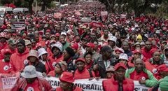 Thousands of teachers march against budget cuts