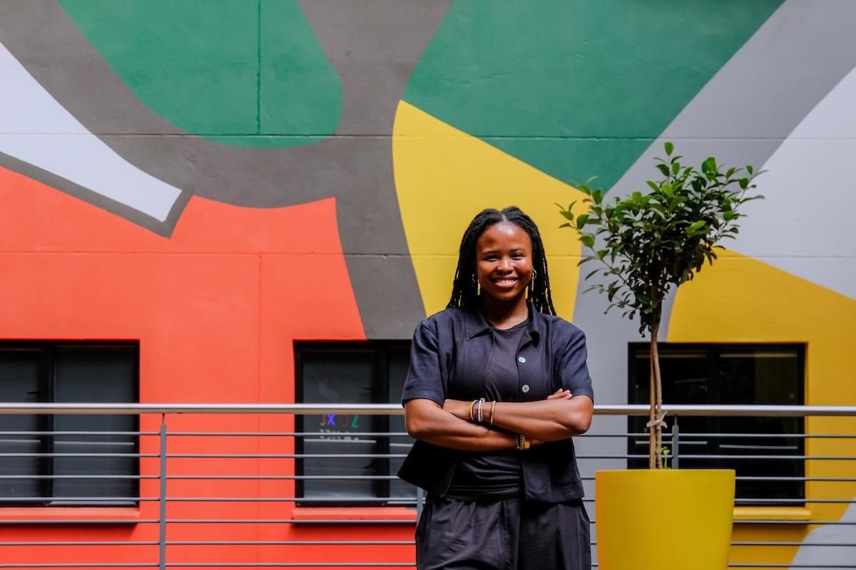 Artist Thobile Mavuso commissioned by Thrive Student Living for the mural