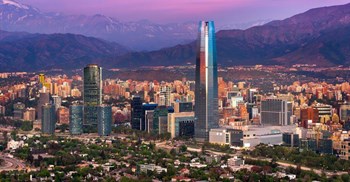 Source: © 123rf  Chilean advertisers currently allocate an average of 3.6% of their revenue to communication, marketing, and advertising budgets says Scopen research. Pictured: Panoramic view of Santiago de Chile with the Andes mountain range in the background.