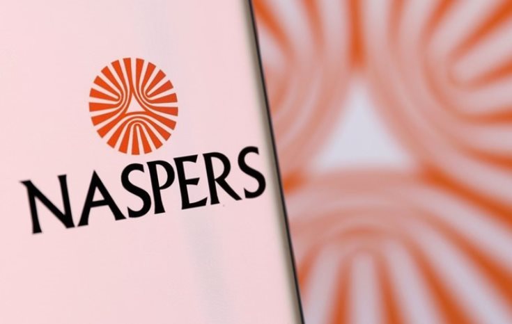 Naspers' logo is pictured on a smartphone in this illustration taken, 4 December 2021. Reuters/Dado Ruvic/Illustration