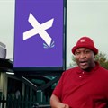 South African television personality Xolani Maphanga stars in the ad. Source: YouTube.
