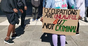 Housing activists protesting at the Cape Town Civic Centre in 2021. Archive photo: Liezl Human/GroundUp