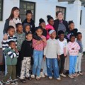 Teachers Tracey Billingham and Gabby Thompson with young learners.