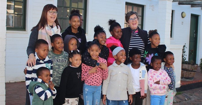 Teachers Tracey Billingham and Gabby Thompson with young learners.