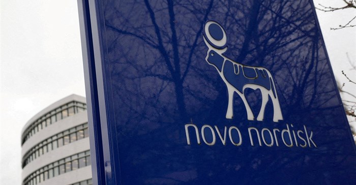 FILE PHOTO: The logo of pharmaceutical company Novo Nordisk is displayed in front of its offices in Bagsvaerd, Copenhagen, Denmark. Image credit: Reuters/Tom Little/File Photo