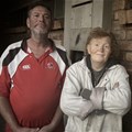 Source: GroundUp/Kimberly Mutandiro. Johan Swanepoel and his partner, Wilma De Villiers, outside their home at Sondela Village.