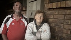 Source: GroundUp/Kimberly Mutandiro. Johan Swanepoel and his partner, Wilma De Villiers, outside their home at Sondela Village.