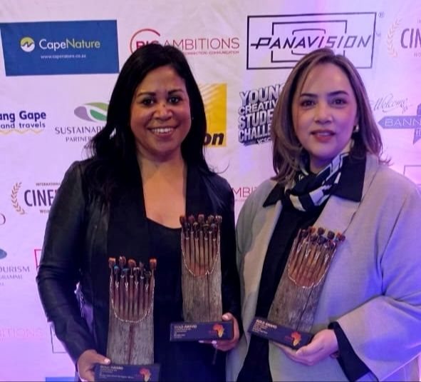 Cape Town Tourism's CMO Briony Brookes and head of digital marketing Rhoda Davids proudly receiving the awards.