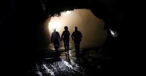 Workers are seen underground at a mine near Pretoria. Image credit: Reuters/Siphiwe Sibeko/File Photo