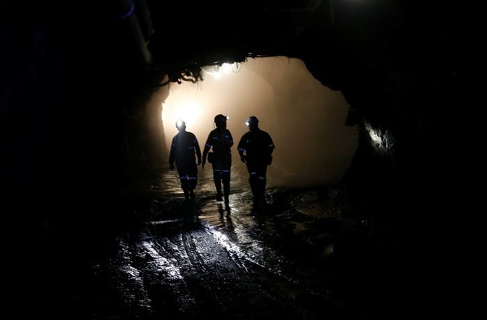 Workers are seen underground at a mine near Pretoria. Image credit: Reuters/Siphiwe Sibeko/File Photo