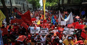 The Congress of South African Trade Unions (Cosatu) and affiliates walk through the street of Cape Town as they embark on a nationwide strike to mark World Day of Decent Work, in Cape Town, South Africa, 7 October 2024. Reuters/Esa Alexander/File Photo