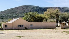 Source: Supplied. A photograph of the outbuildings and farmhouse comprising the Mouton House in McGregor, taken in 2018 before it was completely stripped by vandals.