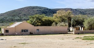Source: Supplied. A photograph of the outbuildings and farmhouse comprising the Mouton House in McGregor, taken in 2018 before it was completely stripped by vandals.