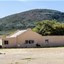 Source: Supplied. A photograph of the outbuildings and farmhouse comprising the Mouton House in McGregor, taken in 2018 before it was completely stripped by vandals.