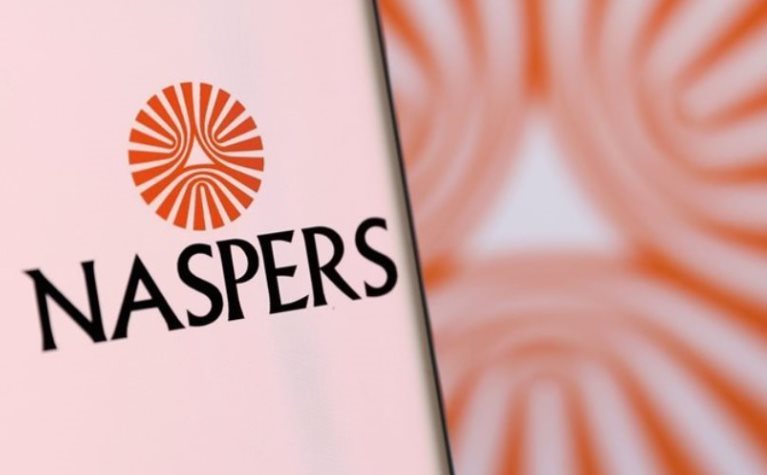 Naspers' logo is pictured on a smartphone in this illustration taken, 4 December 2021. Reuters/Dado Ruvic/Illustration