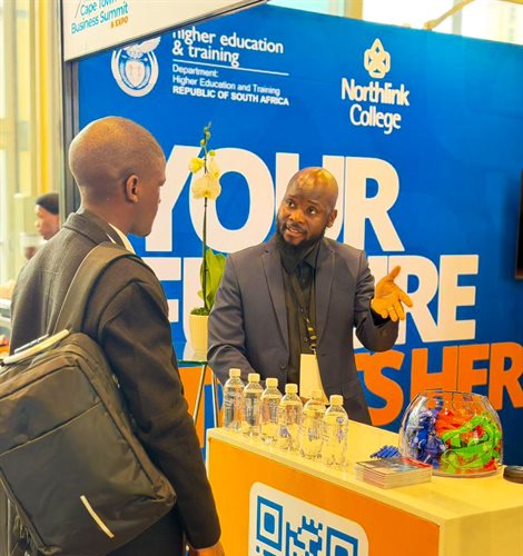 Mr Mohale Manyana engaging with an entrepreneurship support partner during the Cape Town Business Summit & Expo.
