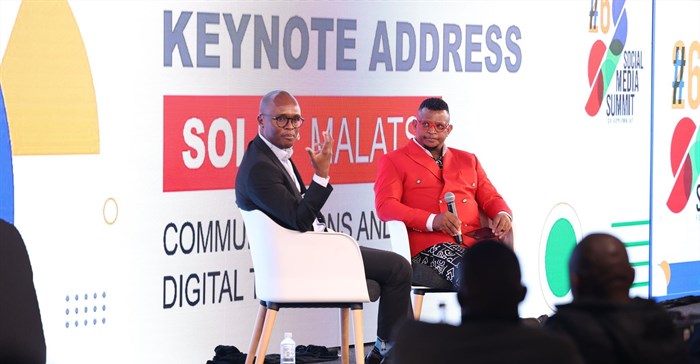 Minister of Communications and Digital Technologies, Solly Malatsi and Lorato Tshenkeng, founder and CEO of Decode. in conversation during the Social Media Summit for Government (Image supplied)