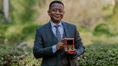 Professor Mike Sathekge – head of the Department of Nuclear Medicine at UP and Steve Biko Academic Hospital, and president and CEO of NuMeRI – with his Harry Oppenheimer Fellowship Award at the announcement ceremony at the Brenthurst Library. Image supplied.