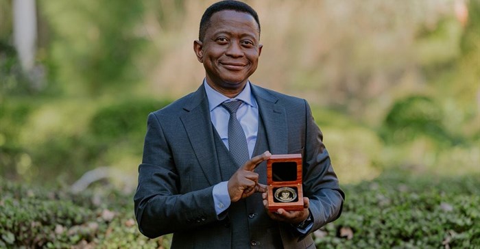 Professor Mike Sathekge – head of the Department of Nuclear Medicine at UP and Steve Biko Academic Hospital, and president and CEO of NuMeRI – with his Harry Oppenheimer Fellowship Award at the announcement ceremony at the Brenthurst Library. Image supplied.