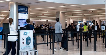 Travellers walk at the Charlotte Douglas International Airport in Charlotte, North Carolina, US. Image credit: Reuters/Kaylee Greenlee/File Photo