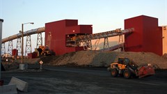 Two loaders work outside the ore processing and recovery plant at De Beers' Snap Lake Diamond Mine, Northwest Territories, Canada. Image credit: , , via Wikimedia Commons
