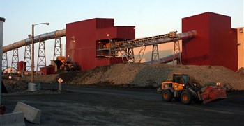 Two loaders work outside the ore processing and recovery plant at De Beers' Snap Lake Diamond Mine, Northwest Territories, Canada. Image credit: , , via Wikimedia Commons