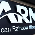 A logo of the African Rainbow Minerals (ARM) is seen at the company's offices in Sandton. Image credit: Reuters/Siphiwe Sibeko