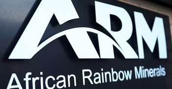 A logo of the African Rainbow Minerals (ARM) is seen at the company's offices in Sandton. Image credit: Reuters/Siphiwe Sibeko