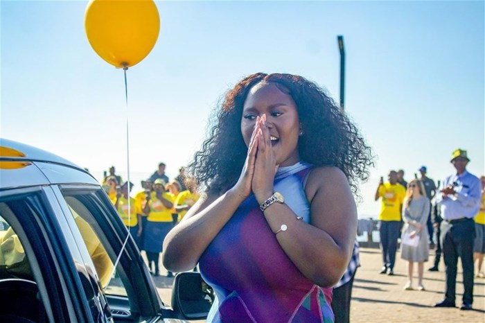 Pure joy after winning a new Suzuki car from aQuellé.